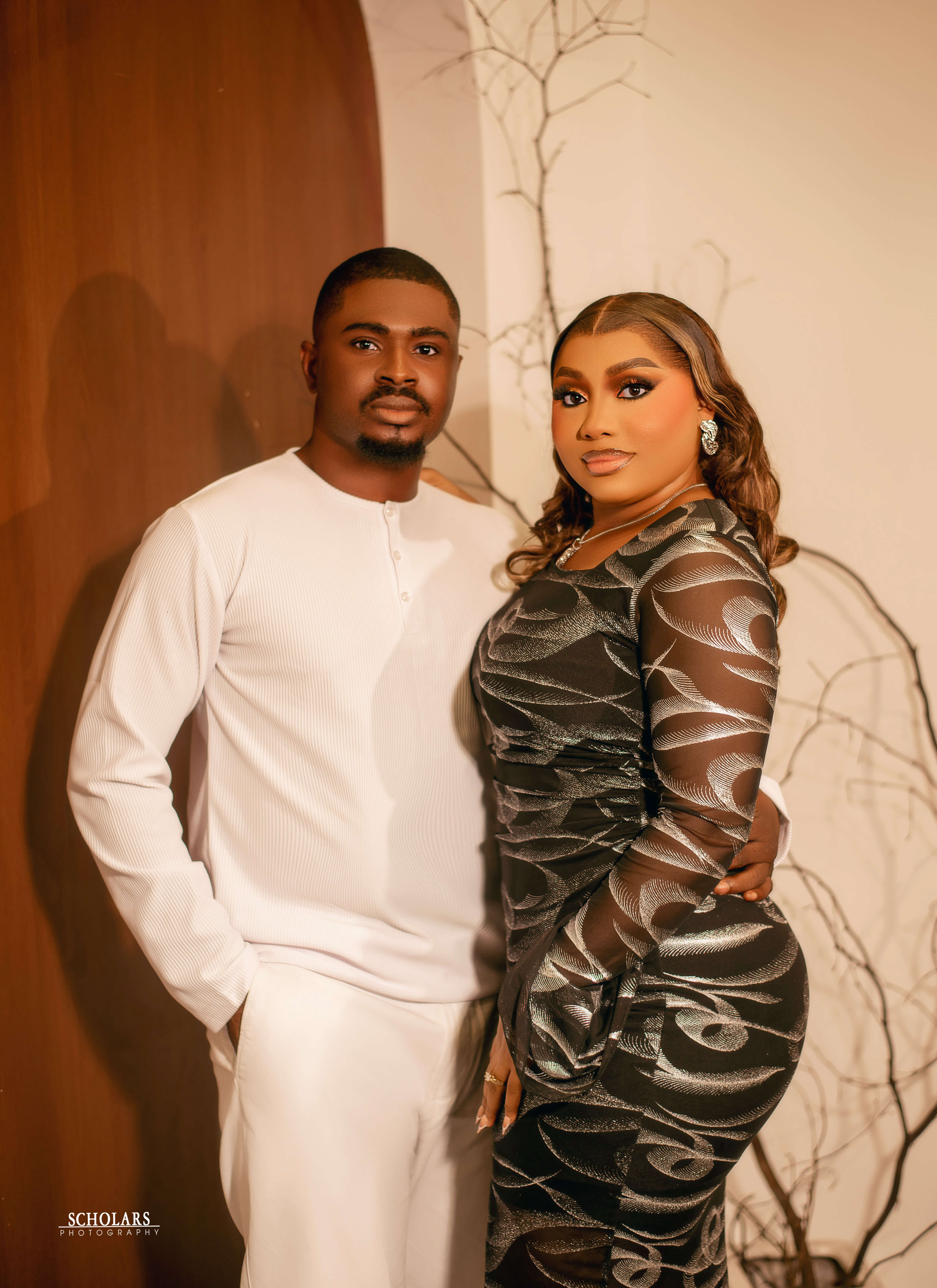 Tina and Temple, elegant and poised, standing together